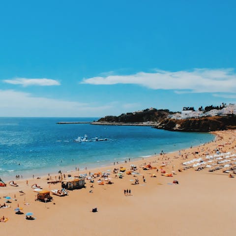 Spend sunny days on the beach in Albufeira, a short walk away
