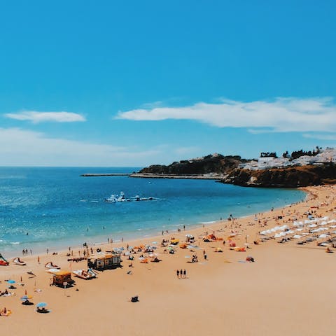 Spend sunny days on the beach in Albufeira, a short walk away