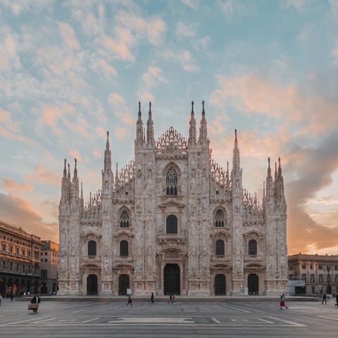 Visit the Duomo di Milano, a five-minute walk away
