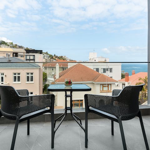 Drink in the ocean views over coffee on the private balcony