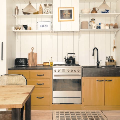 Cook up tasty treats in the rustic-style kitchen