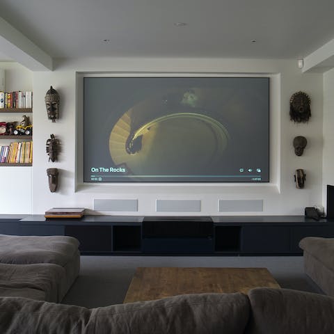 Curl up for a movie night in front of the cinema-style screen