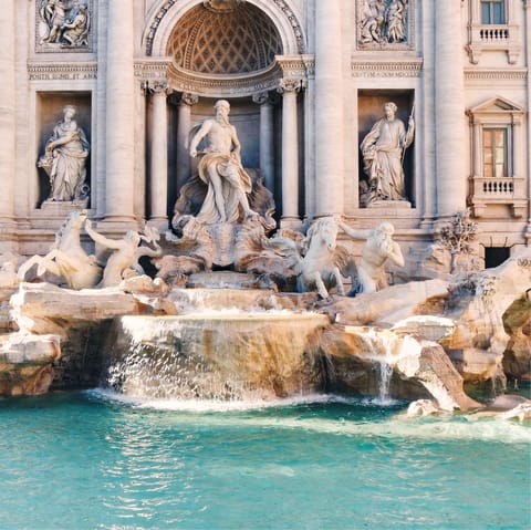 Visit the iconic Trevi Fountain, just an eight-minute walk away