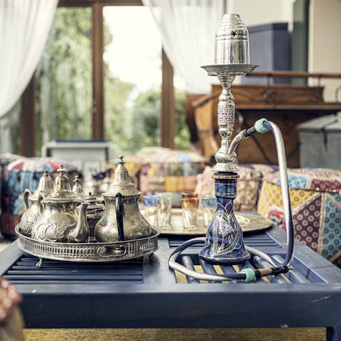Relax with shisha and tea in the Morrocan style conservatory lounge area 