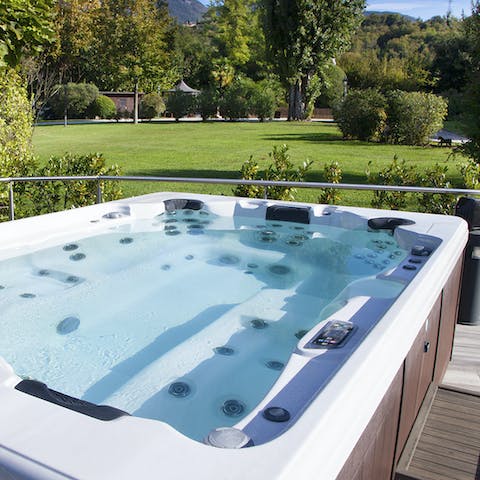Unwind in the bubbling jacuzzi hot tub 