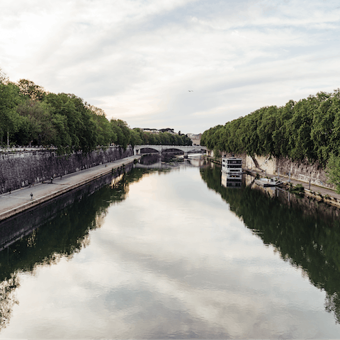 Wander the banks of the Tiber, only five minutes' walk from the apartment