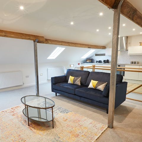 Spend an evening together in the cosy living area with original beams