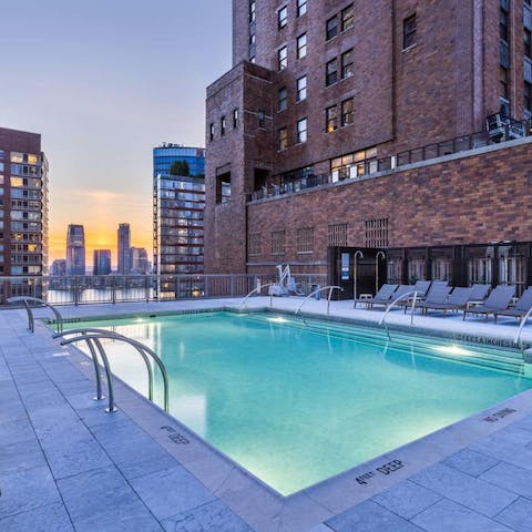 Watch the sunset from the rooftop swimming pool