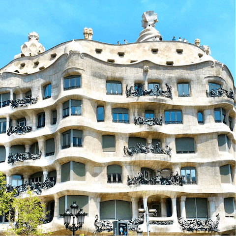 Head up to the beautiful roof of Casa Milà, eight minutes away