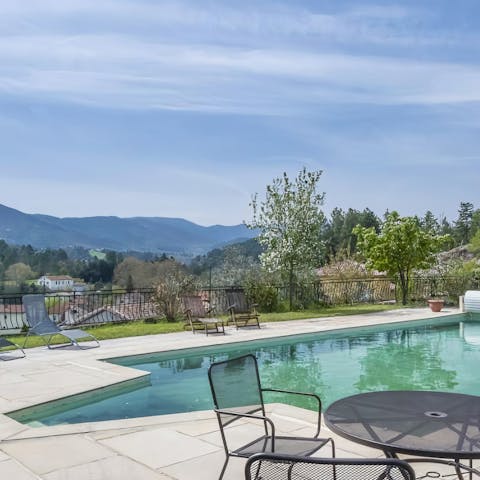 Make a splash in the private swimming pool overlooking the hills