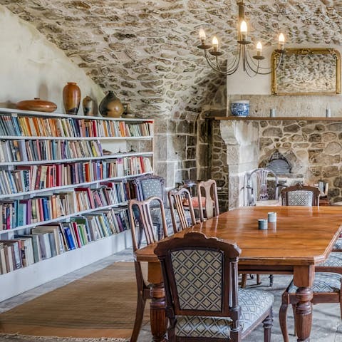 Select a book from the home library to enjoy in a quiet corner of the house 