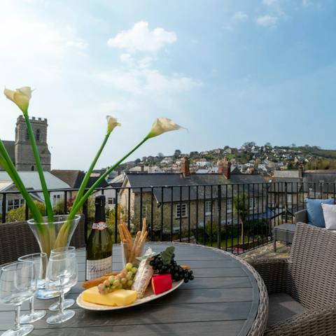 Dine alfresco on your south-facing balcony and enjoy views across Beer out to sea
