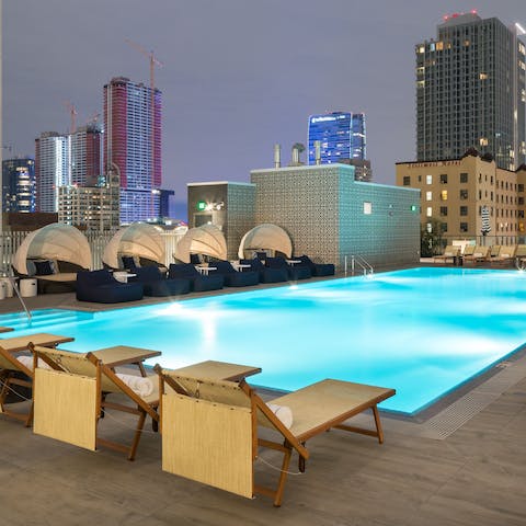 Relax around the resort-like pool come day and night
