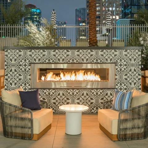 Grab a beer and unwind  by the outdoor fire on chilly evenings