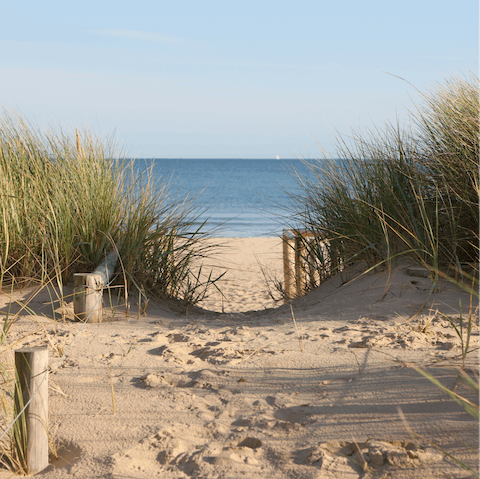 Sink your toes in the sand at Porthleven Beach, a twelve-minute walk away