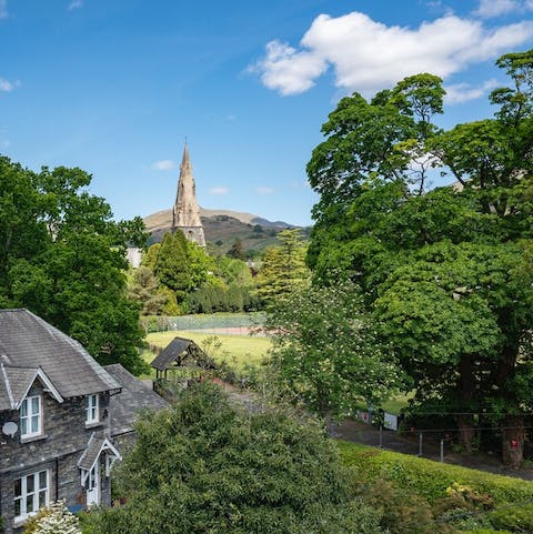 Gaze out over the Gothic-style church spire from your balcony