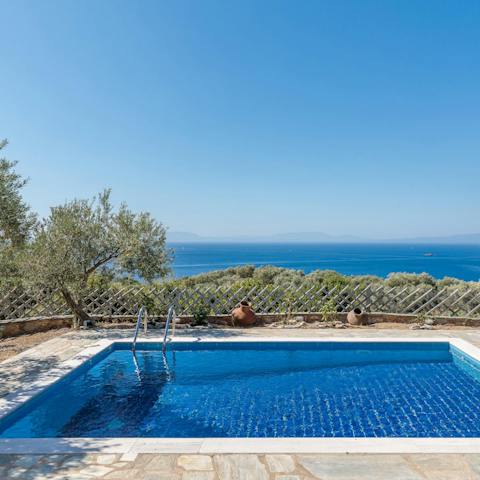 Spend lazy afternoons floating in the pool and admiring the Aegean Sea views