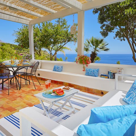 Enjoy alfresco dinner and drinks on the sea-facing terrace