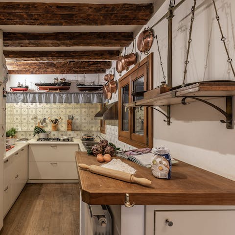 Whip up sarde in saor in the traditional Venetian galley kitchen
