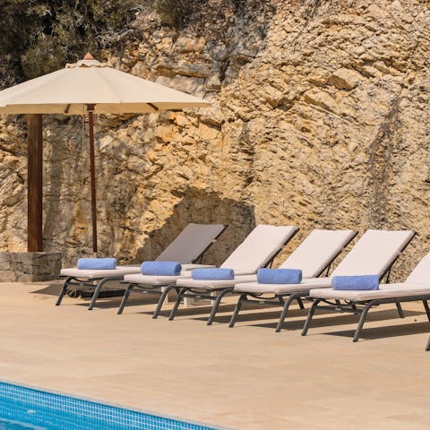 Catch some sun on the poolside loungers and unwind with a cool drink