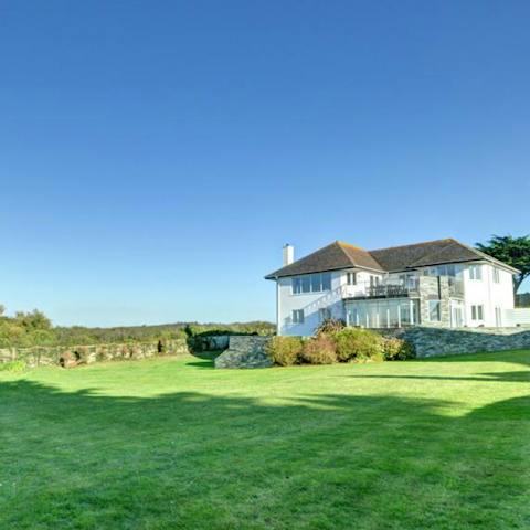 Let the kids run wild on the grassy lawn as you sip a sundowner