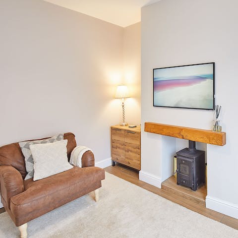 Enjoy the warmth and comfort of the cosy living room 
