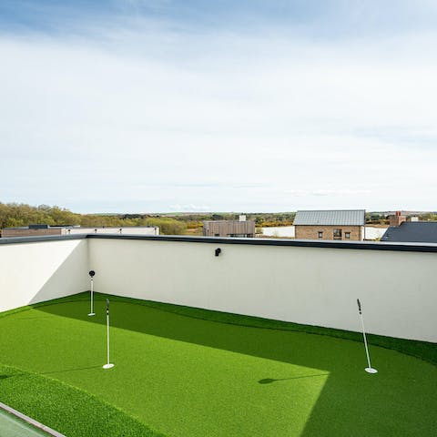 Practice your golfing skills on the putting green