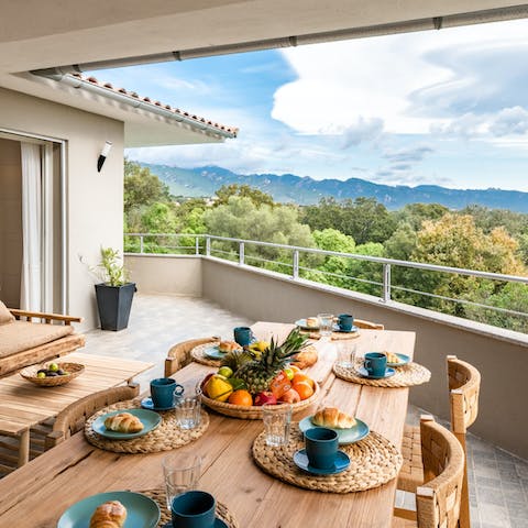 Take in the views of the mountains over lunch on the balcony