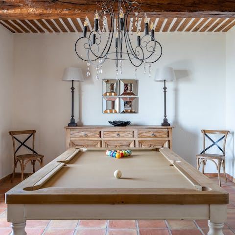 Challenge your friends and family to a game of pool on the stylish pool table