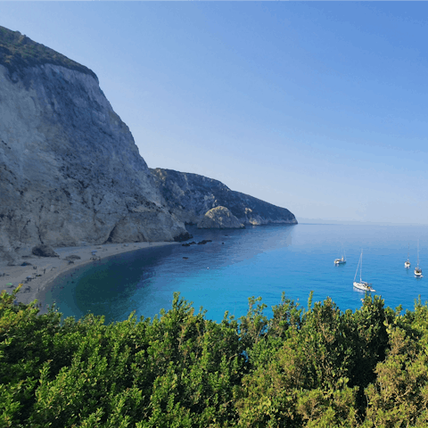 Stay by the coastline and embark on a boat trip to explore the Ionian Sea