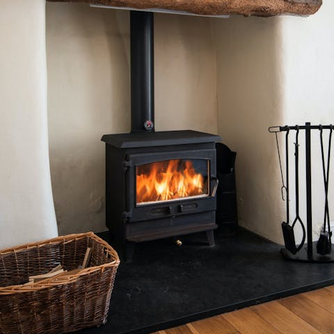 Warm your toes in front of the wood-burning stove on a chilly afternoon