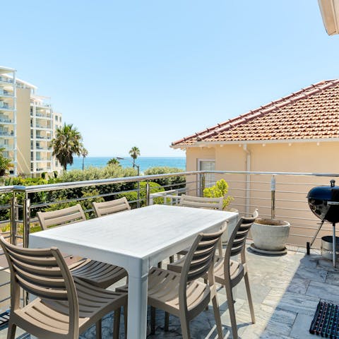 Enjoy barbecues out on the dining terrace with sea views