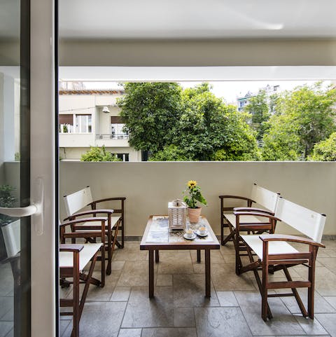 Enjoy alfresco breakfasts and cups of fresh Greek coffee on the balcony