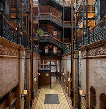 Admire skylit ironwork at the Bradbury