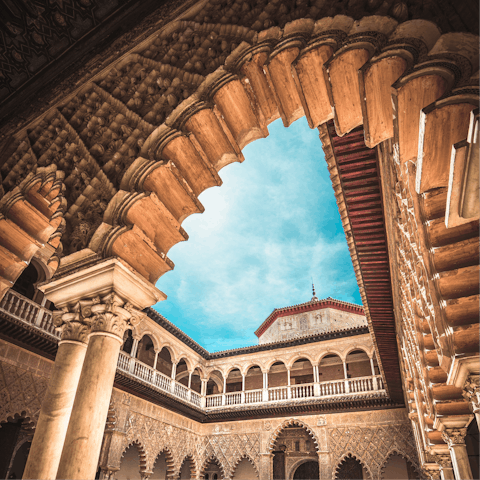 Take a short stroll over to admire the stunning Royal Alcázar of Seville