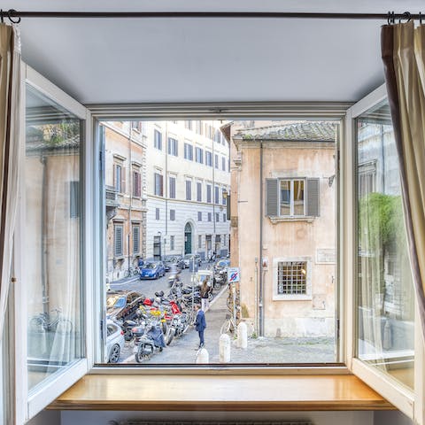 Open a window onto Roman life and people-watch from the comfort of your apartment