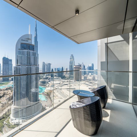 Watch the world pass by from your private balcony