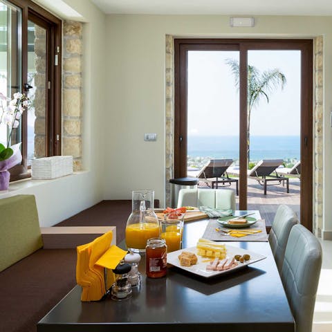 Have a private chef serve up a breakfast of champions to enjoy with a sea view