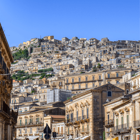 Explore the historical town of Modica, renowned for its spectacular Baroque architecture
