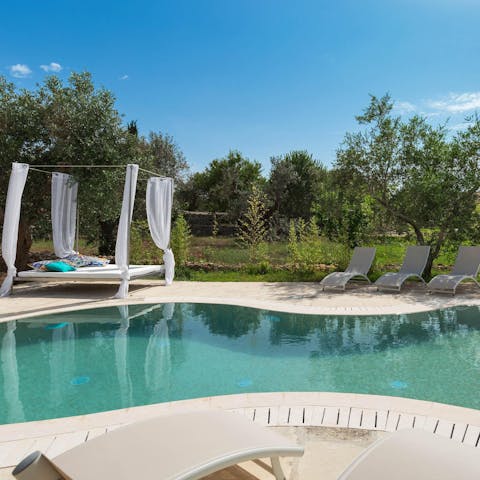 Rest on the day bed with a good book or enjoy a peaceful float in the private pool