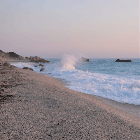 Visit Perigiali beach to find a quiet pebble beach with warm waters, ideal for snorkeling