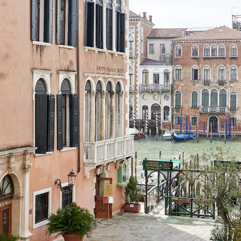 Admire the view of the Grand Canal from your private balcony