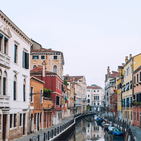 Walk just ten minutes along a picturesque waterway to the Piazza San Marco 
