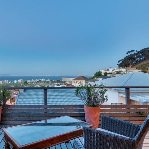 Unwind on the balcony with a view of the ocean