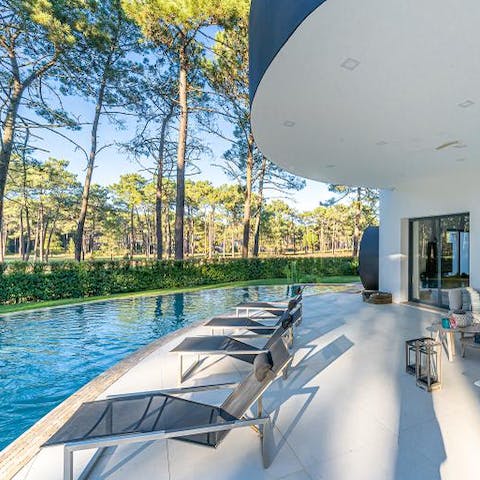 Relax by the pool before heading out to discover the sights of Lisbon  
