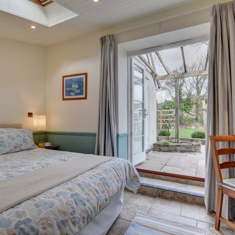 Claim the sought-after ground-floor bedroom for direct outdoor access via the French doors