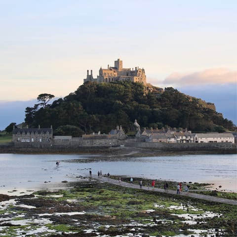 Drive along the scenic coast to St Michael's Mount