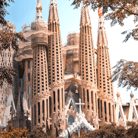Marvel at the striking architectural beauty of La Sagrada Familia - just a twenty-two minute walk away