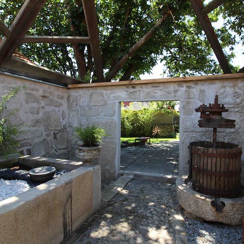 Explore the character features in the grounds – the old barn hides an antique wine press
