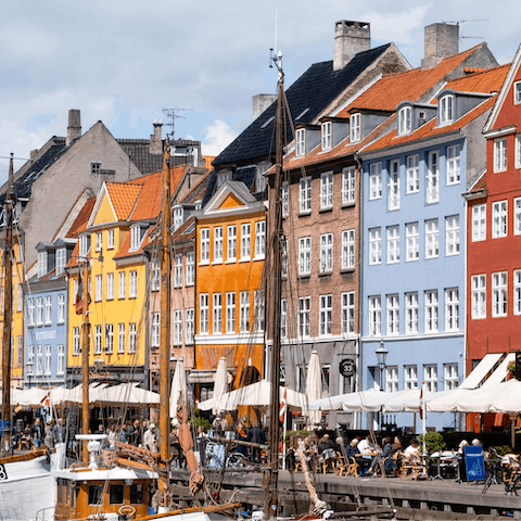Spend the day exploring the atmospheric streets of Copenhagen – an hour's drive away